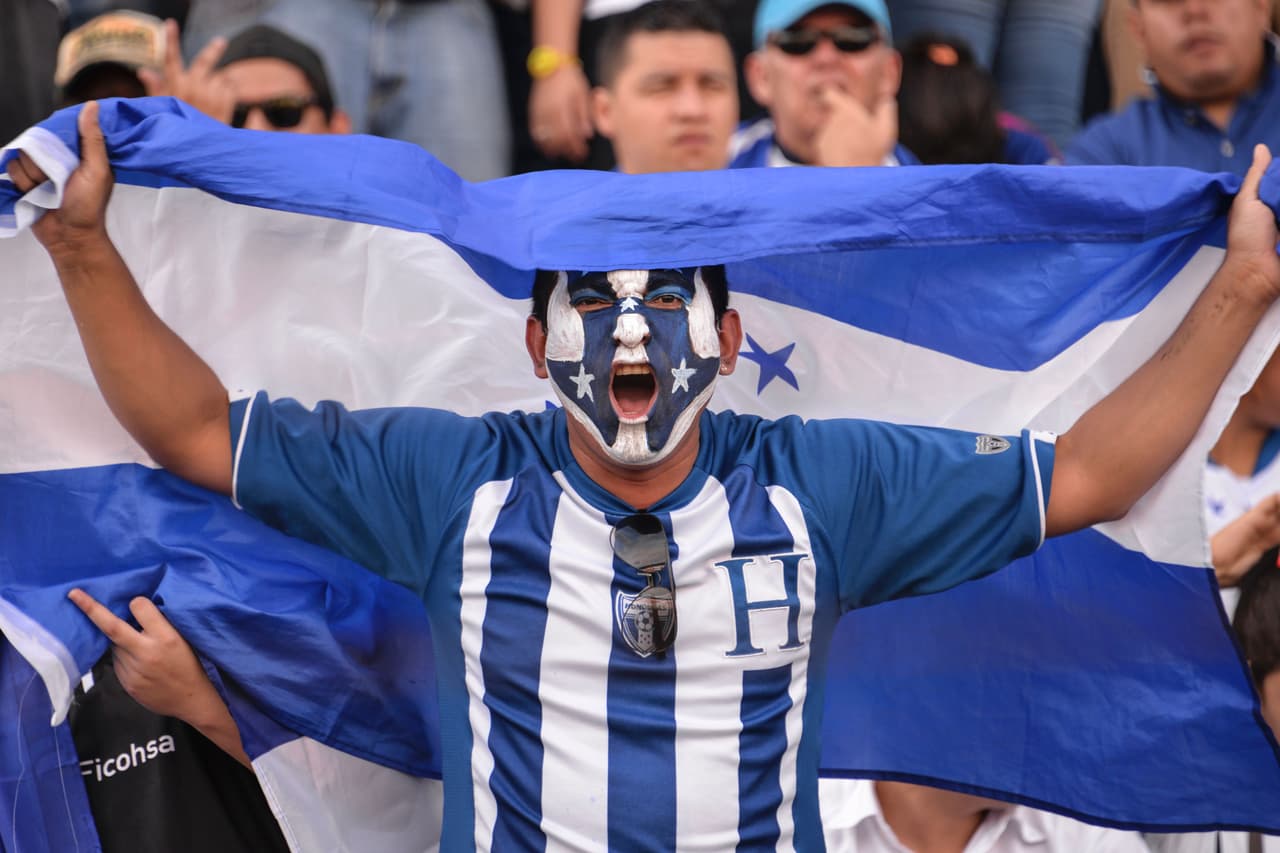 A supporter of Honduras waits for the start of the 2018 FIFA World Cup qualifier football match against Trinidad & Tobago in San Pedro Sula, Honduras, on November 15, 2016. / AFP / GERARDO MAZARIEGOS (Photo credit should read GERARDO MAZARIEGOS/AFP/Getty Images)