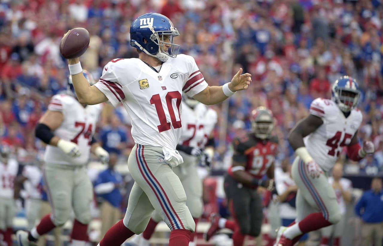 Eli Manning llegó a 96 victorias en su carrera, el máximo para un quarterback de los Giants y su equipo terminó derrotando 32-18 a los Buccaneers.