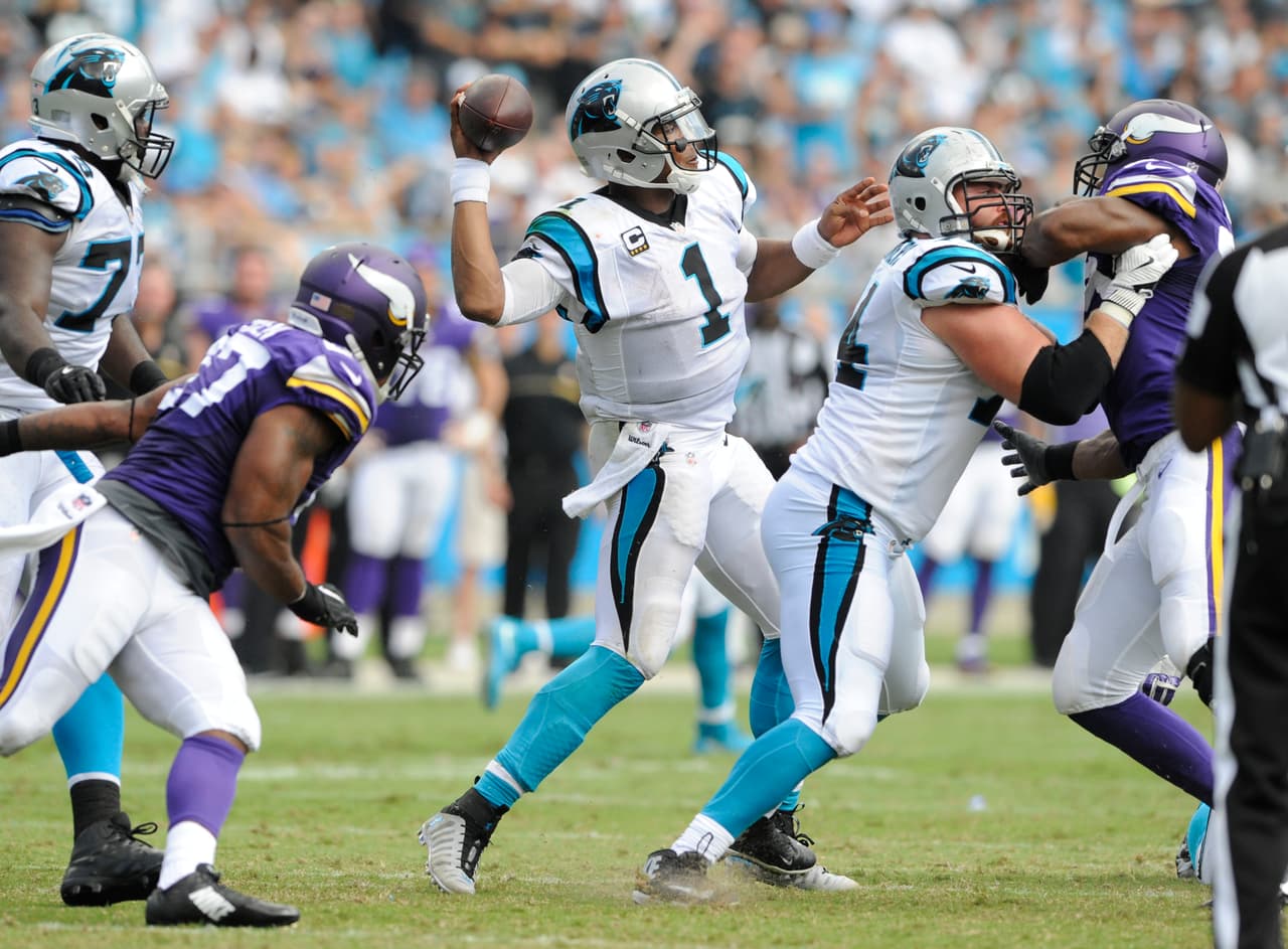Carolina Panthers' Cam Newton (1) looks to pass against the Minnesota Vikings in the second half of an NFL football game in Charlotte, N.C., Sunday, Sept. 25, 2016. (AP Photo/Mike McCarn)