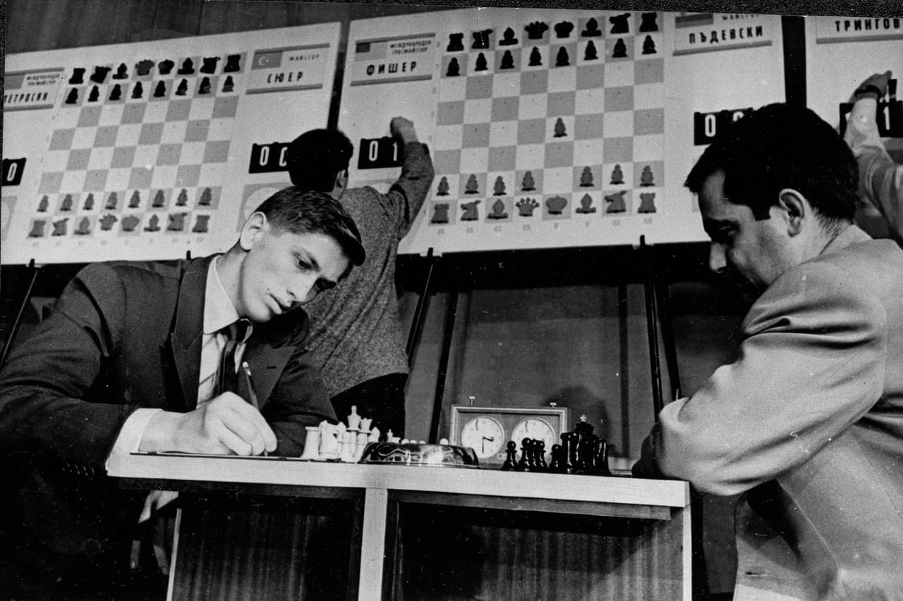The U.S.'s Bobby Fischer, left, makes a move against Bulgaria's Nikola Padevsky in their game in the 15th Chess Olympiad at Golden Sands, near Varna, Bulgaria, Sept. 1962. (AP Photo)