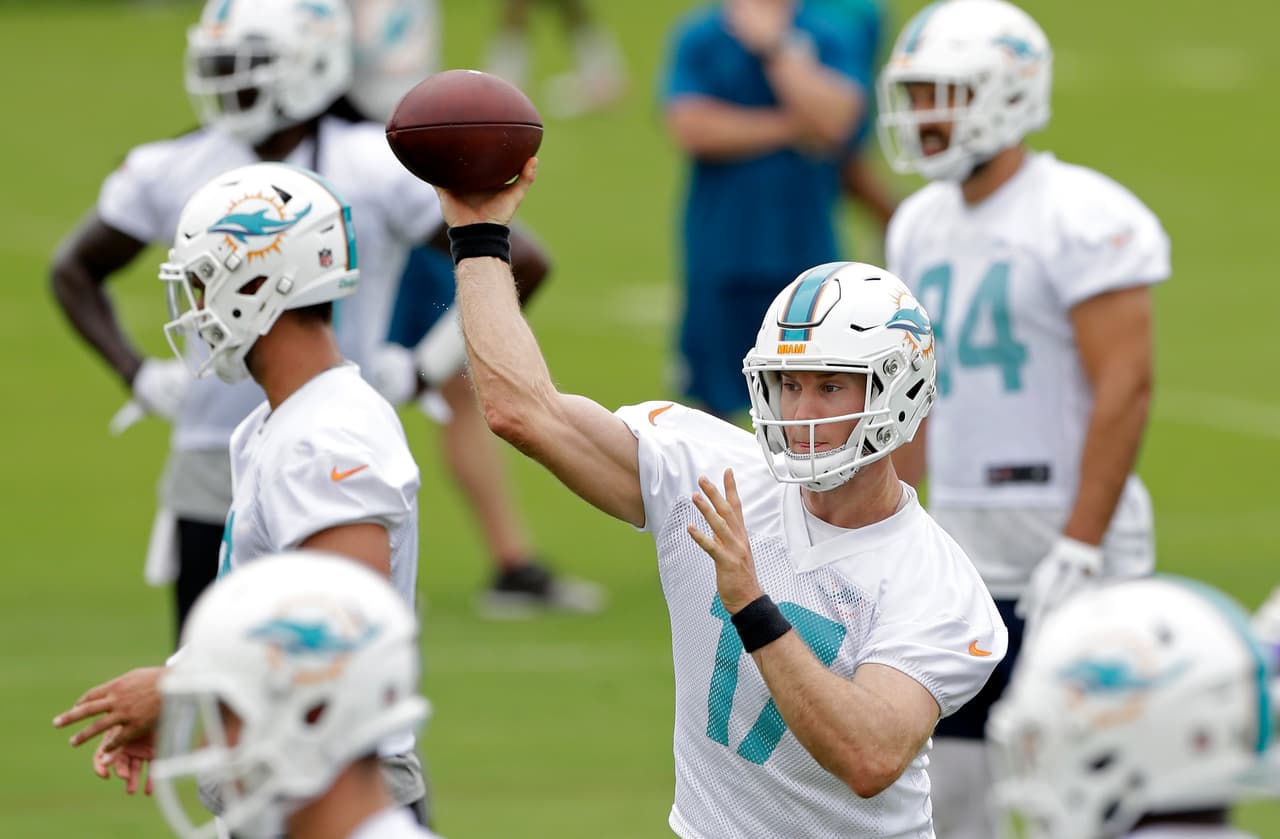 Miami Dolphins quarterback Ryan Tannehill (17) passes during practice at the team's NFL football training facility, Monday, June 6, 2016, in Davie, Fla. (AP Photo/Alan Diaz)