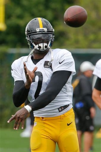 Michael Vick salió a la cancha por vez primera vistiendo el uniforme de los Steelers. Checa las imágenes.