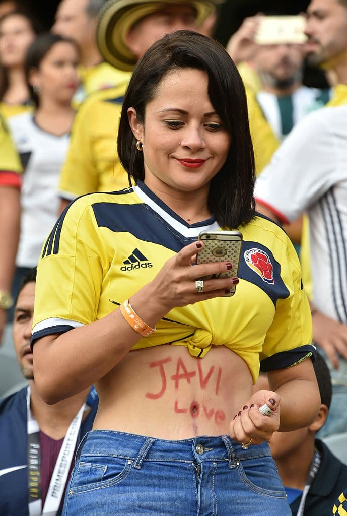 Fans of Colombia cheer for their team during the Copa America Centenario semifinal football match against Chile, in Chicago, Illinois, United States, on June 22, 2016. / AFP / Nelson ALMEIDA (Photo credit should read NELSON ALMEIDA/AFP/Getty Images)