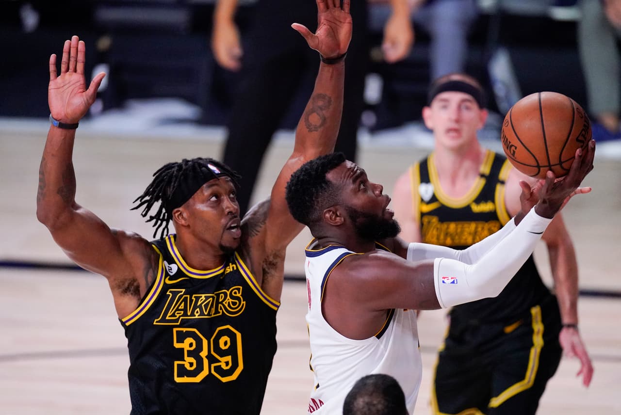 Anthony Davies anota 31 puntos y encesta la canasta que le da el triunfo a los Lakers 103-105 sobre los Denver Nuggets.