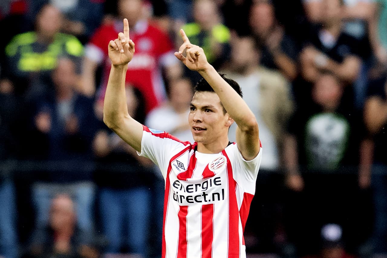 Eindhoven's Hirving Lozano (2ndL) celebrates after scoring during their Eredivisie soccer match Eindhoven (PSV) versus Alkmaar Zaanstreek (AZ) on August 12, 2017 in Eindhoven, in the Netherlands. / AFP PHOTO / ANP / Olaf KRAAK / Netherlands OUT - Belgium OUT (Photo credit should read OLAF KRAAK/AFP/Getty Images)