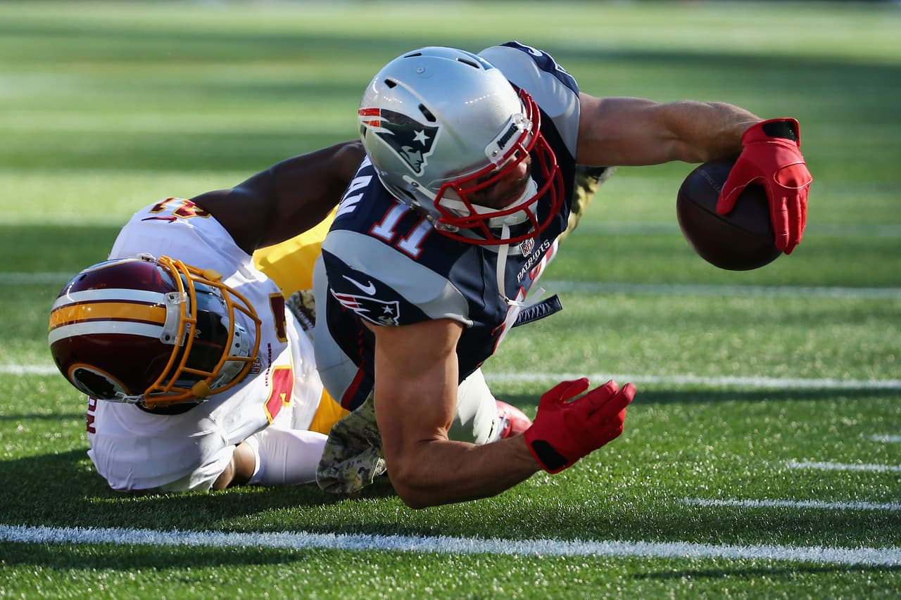 Los Patriots arrollaron a los Redskins 27-10 para mantener la racha ganadora de 8-0 en la temporada. Checa las mejores tomas del partido.