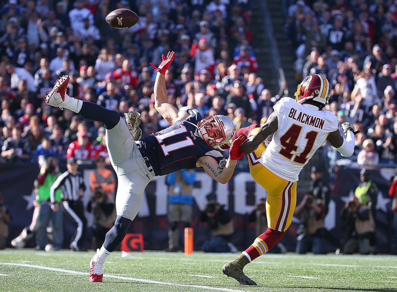 Los Patriots arrollaron a los Redskins 27-10 para mantener la racha ganadora de 8-0 en la temporada. Checa las mejores tomas del partido.