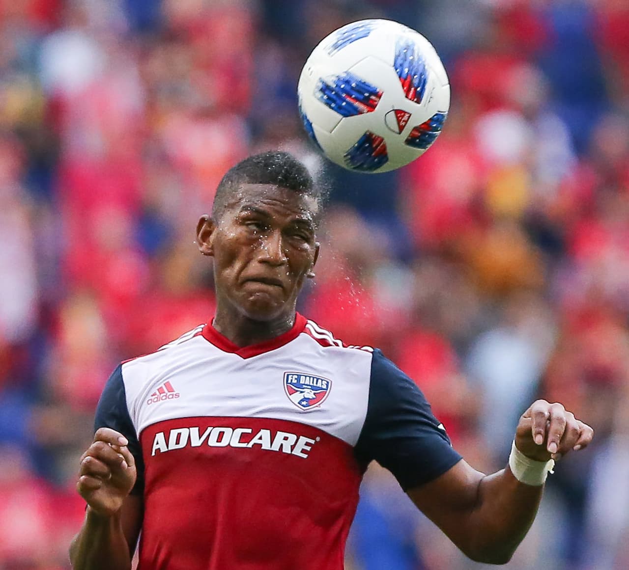 Jun 23, 2018; Harrison, NJ, USA; FC Dallas midfielder Carlos Gruezo (7) heads the ball against the New York Red Bulls during the second half at Red Bull Arena. Mandatory Credit: Vincent Carchietta-USA TODAY Sports