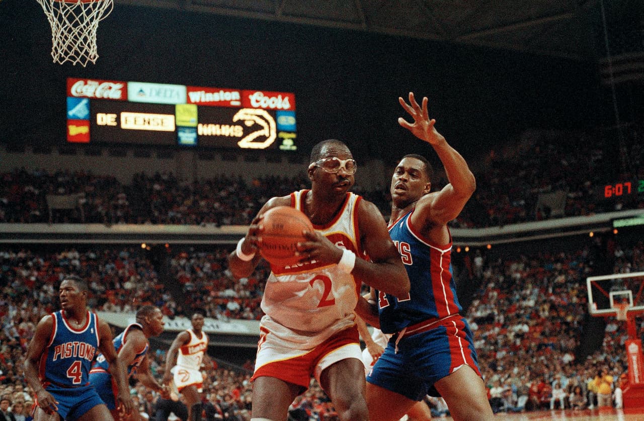 <b>9. Moses Malone -</b> 27,409 puntos