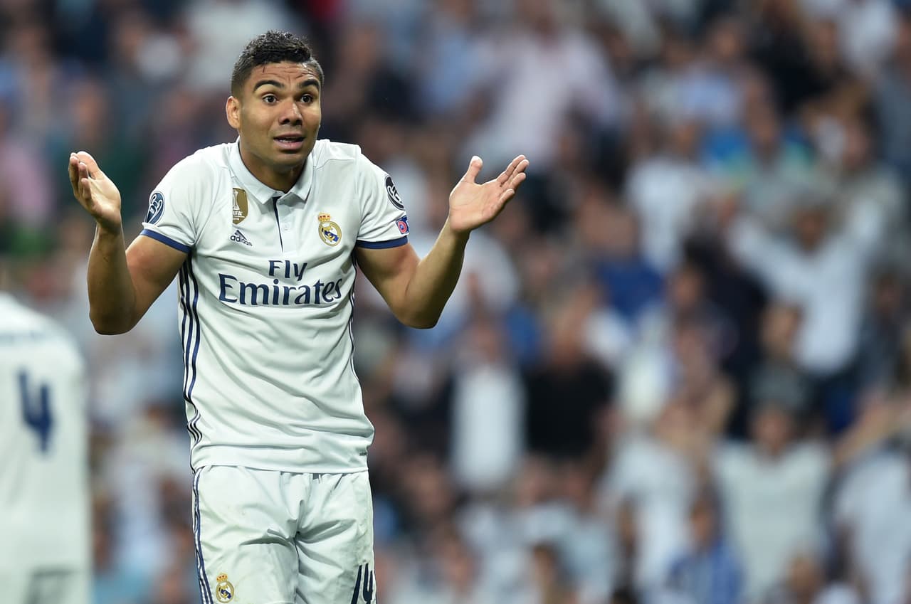 Real Madrid's Brazilian midfielder Casemiro reacts during the UEFA Champions League quarterfinal second leg football match Real Madrid vs FC Bayern Munich at the Santiago Bernabeu stadium in Madrid, Spain, on April 18, 2017. / AFP PHOTO / Christof STACHE (Photo credit should read CHRISTOF STACHE/AFP/Getty Images)