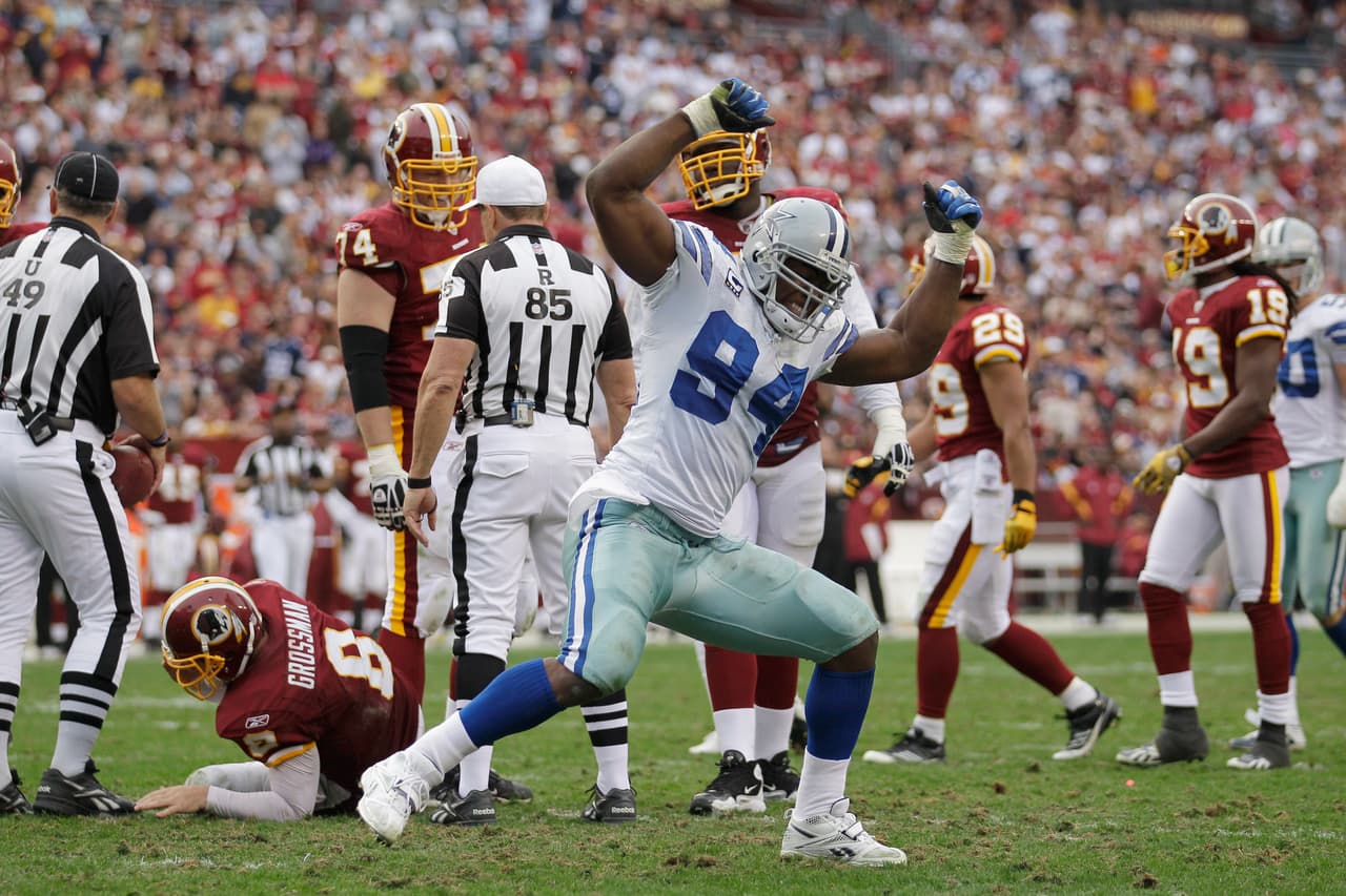 LANDOVER, MD - NOVEMBER 20: DeMarcus Ware #94 of the Dallas Cowboys celebrates after sacking Rex Grossman #8 of the Washington Redskins during the second half at FedExField on November 20, 2011 in Landover, Maryland. (Photo by Rob Carr/Getty Images)