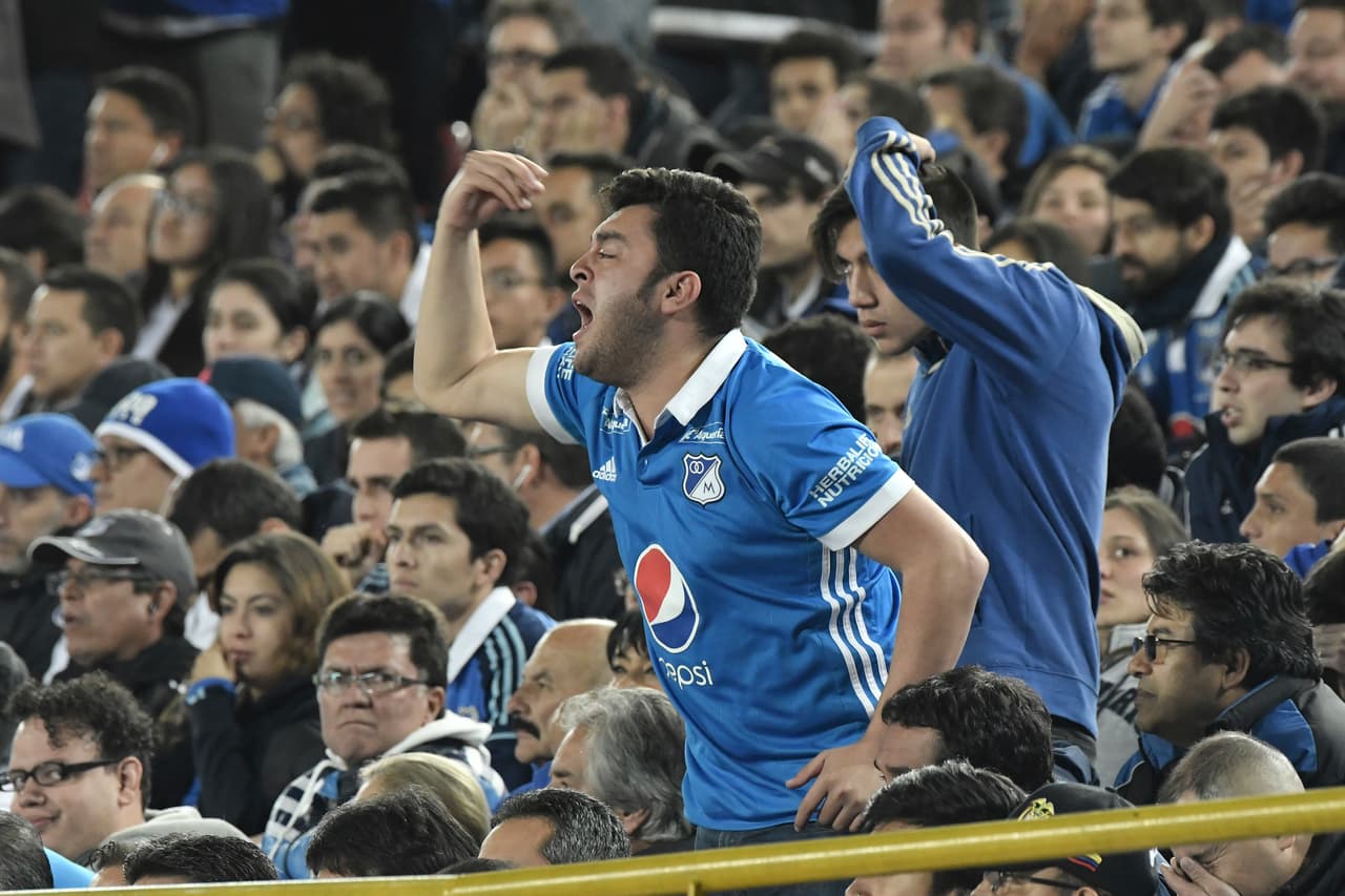 BOGOTA, COLOMBIA - JUNE 07: A fan of Millonarios cheers for his team during the Semi Finals first leg match between Millonarios and Atletico Nacional as part of Liga Aguila I 2017 at Nemesio Camacho Stadium on June 7, 2017 in Bogota, Colombia. (Photo by Gabriel Aponte/Vizzor/LatinContent/Getty Images)