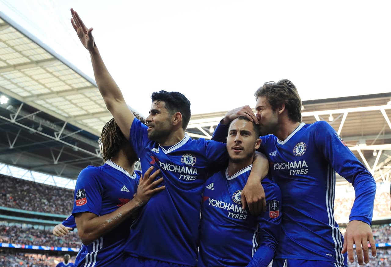 LONDON, ENGLAND - APRIL 22: Eden Hazard of Chelsea celebrates with team mates after he scores his sides third goal during The Emirates FA Cup Semi-Final between Chelsea and Tottenham Hotspur at Wembley Stadium on April 22, 2017 in London, England. (Photo by Richard Heathcote/Getty Images)