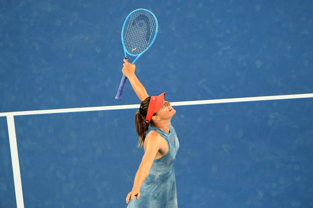 MELBOURNE, AUSTRALIA - JANUARY 18: Maria Sharapova of Russia celebrates winning match point in her third round match against Caroline Wozniacki of Denmark during day five of the 2019 Australian Open at Melbourne Park on January 18, 2019 in Melbourne, Australia. (Photo by Quinn Rooney/Getty Images)