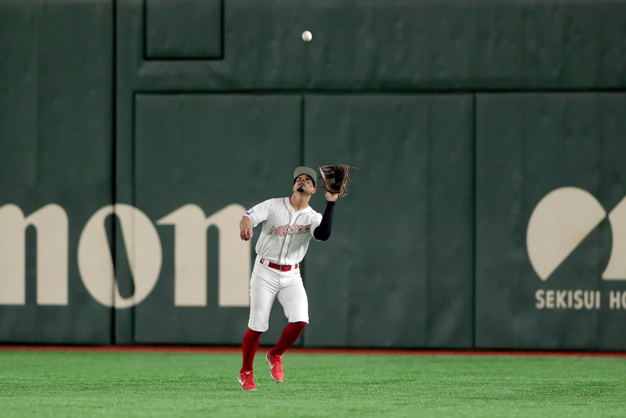 México consigue el boleto para los Juegos Olímpicos luego de vencer a Estados Unidos en extra innings y se queda con el tercer lugar del Premier 12.