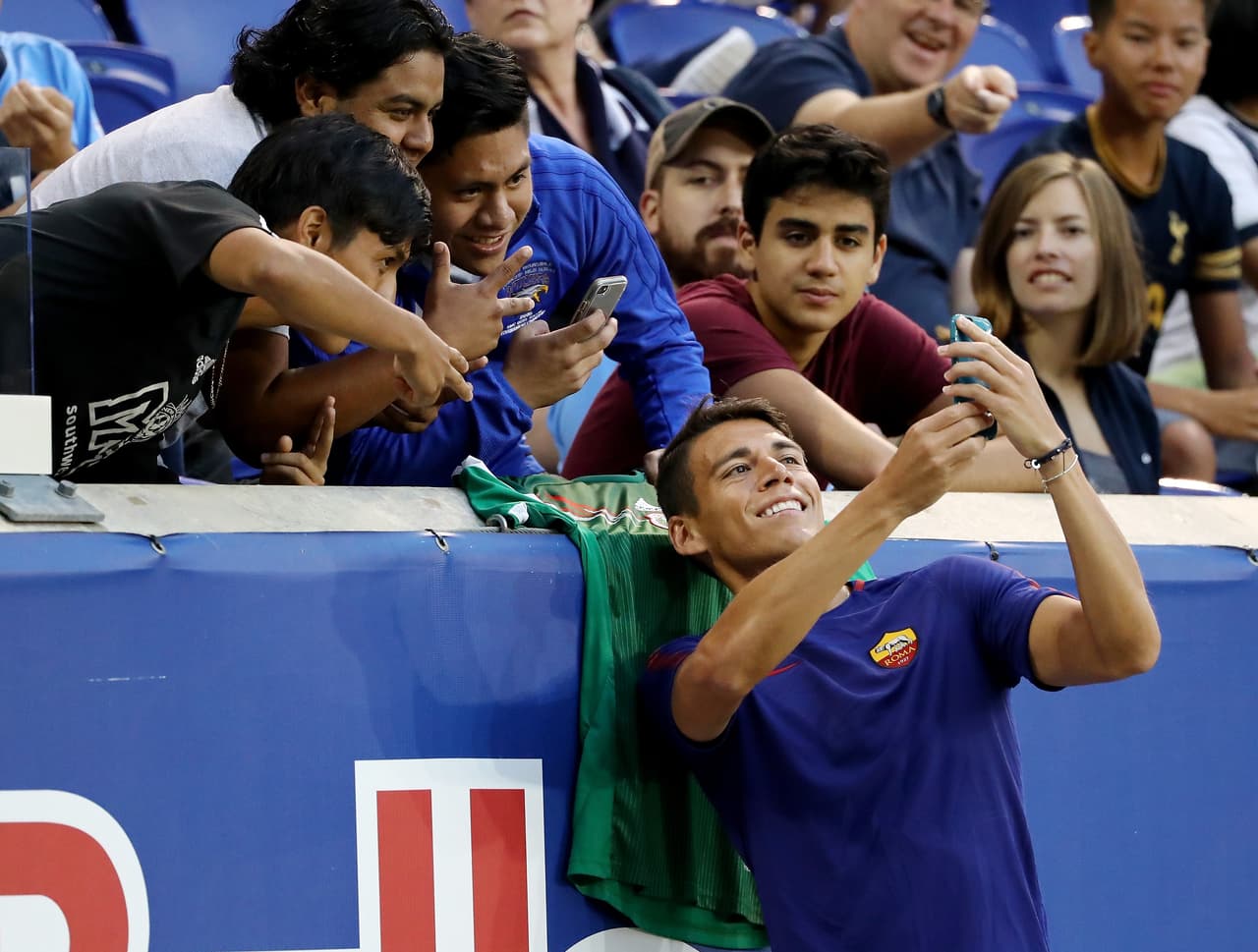 HARRISON, NJ - JULY 25: Hector Moreno #15 of Roma takes a selfie with fans before the match against Tottenham Hotspur during the International Champions Cup on July 25, 2017 at Red Bull Arena in Harrison, New Jersey. (Photo by Elsa/Getty Images)