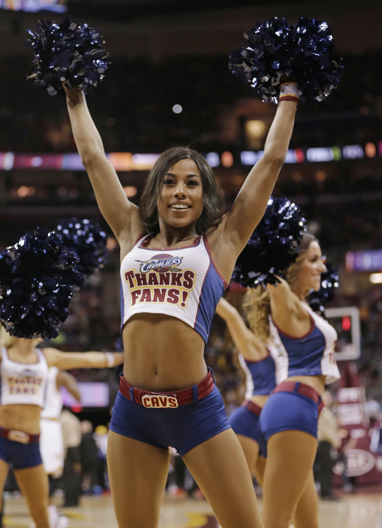 A Cleveland Cavaliers cheerleader performs in the first half of an NBA basketball game between the Detroit Pistons and the Cleveland Cavaliers, Wednesday, April 13, 2016, in Cleveland. (AP Photo/Tony Dejak)