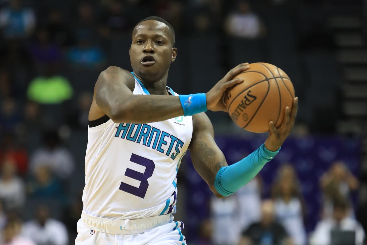 CHARLOTTE, NORTH CAROLINA - OCTOBER 09: Terry Rozier III #3 of the Charlotte Hornets brings the ball up the court against the Miami Heat during their game at Spectrum Center on October 09, 2019 in Charlotte, North Carolina. NOTE TO USER: User expressly acknowledges and agrees that, by downloading and or using this photograph, User is consenting to the terms and conditions of the Getty Images License Agreement. (Photo by Streeter Lecka/Getty Images)