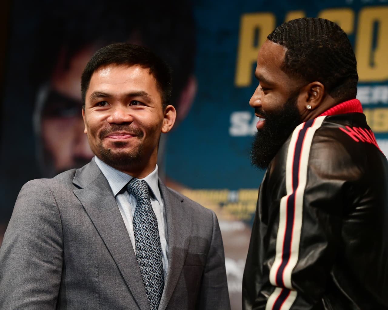 NEW YORK, NY - NOVEMBER 19: Manny Pacquiao (L) and Adrien Broner face off during a press conference at Gotham Hall in preparation for their upcoming match on November 19, 2018 in New York City. The match is set to take place on January 19, 2019 in Las Vegas. (Photo by Sarah Stier/Getty Images)