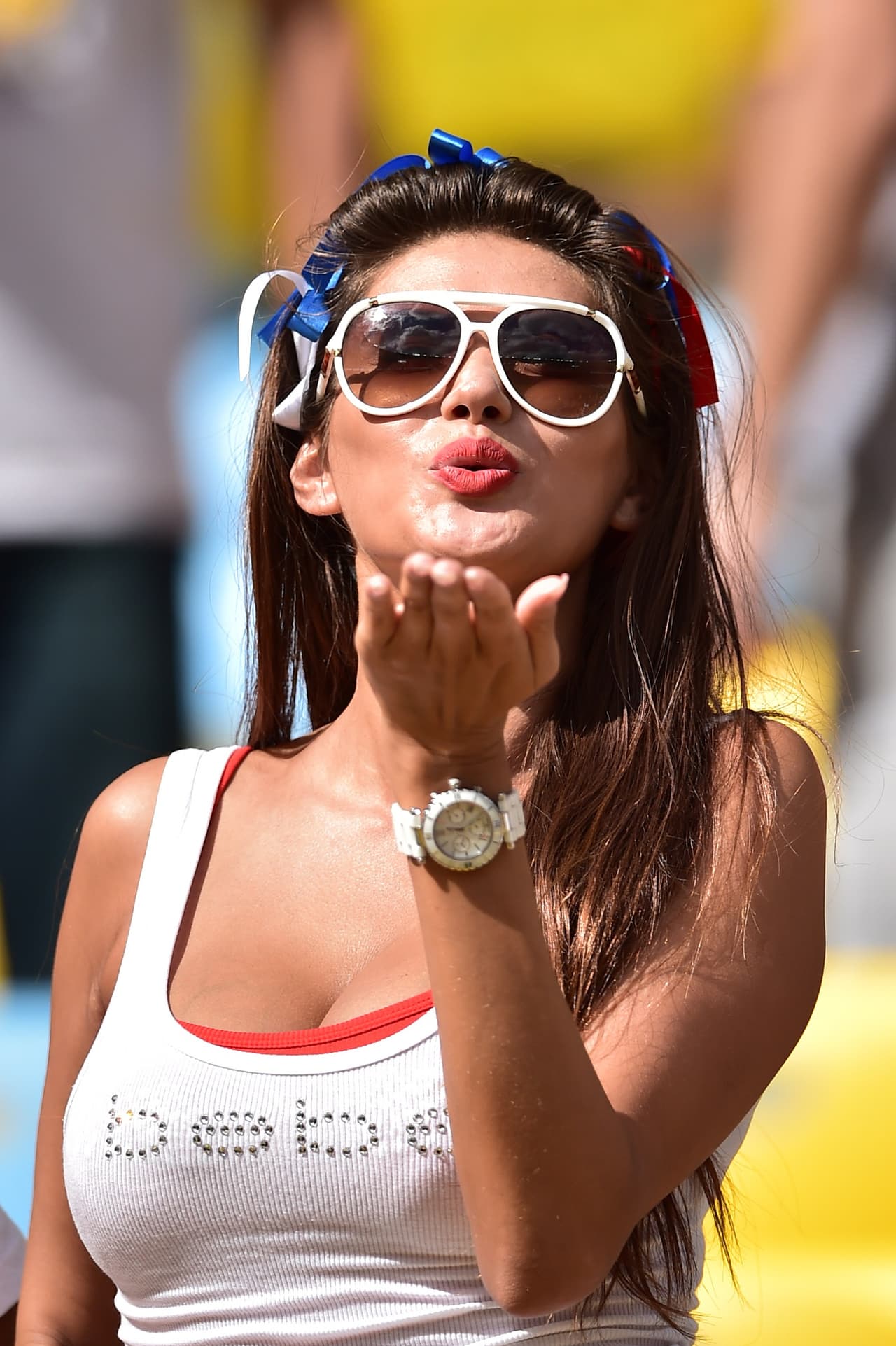 A Russian supporter cheers for her team ahead of the Group H football match between Belgium and Russia at The Maracana Stadium in Rio de Janeiro on June 22, 2014, during the 2014 FIFA World Cup. AFP PHOTO / GABRIEL BOUYS (Photo credit should read GABRIEL BOUYS/AFP/Getty Images)