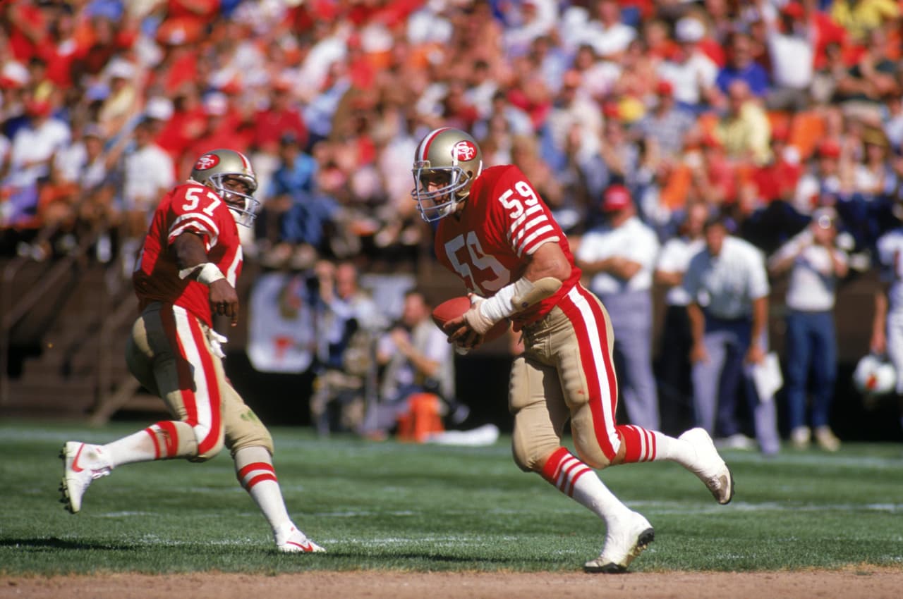1979 TOM COUSINEAU | LB Ohio State - 
<b>Buffalo Bills</b>
<br>
<br>El apoyador Tom Cousineau #59 de San Francisco 49ers intercepta un pase en el juego contra los St. Louis Cardinals en Candlestick Park el 18 de octubre de 1987. Aunque fue reclutado #1 por Buffalo, se negó a firmar con los Bills y se fue a los Montreal Alouettes de la liga canadiense.