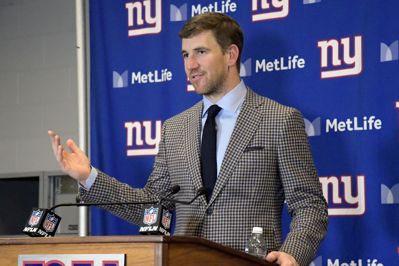 New York Giants quarterback Eli Manning talks to reporters after an NFL football game against the Philadelphia Eagles, Sunday, Dec. 17, 2017, in East Rutherford, N.J. The Eagles won 34-29. (AP Photo/Bill Kostroun)