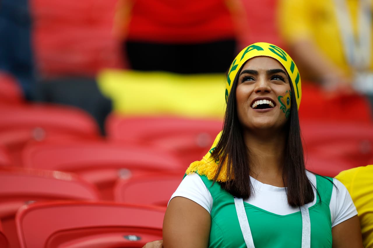 A Brazil fan smiles prior to the quarterfinal match between Brazil and Belgium at the 2018 soccer World Cup in the Kazan Arena, in Kazan, Russia, Friday, July 6, 2018. (AP Photo/Francisco Seco)