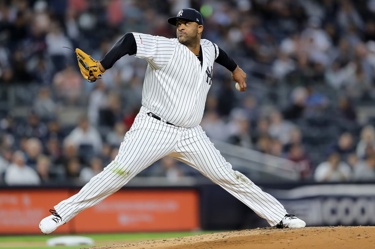 NEW YORK, NEW YORK - SEPTEMBER 18: CC Sabathia #52 of the New York Yankees delivers a pitch in the second inning against the Los Angeles Angels at Yankee Stadium on September 18, 2019 in the Bronx borough of New York City. (Photo by Elsa/Getty Images)