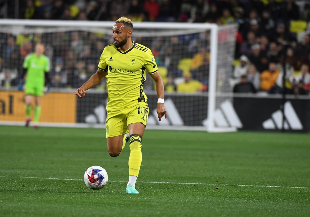 Apr 8, 2023; Nashville, Tennessee, USA; Nashville SC midfielder Hany Mukhtar (10) handles the ball during the first half against the Toronto FC at Geodis Park. Mandatory Credit: Christopher Hanewinckel-USA TODAY Sports