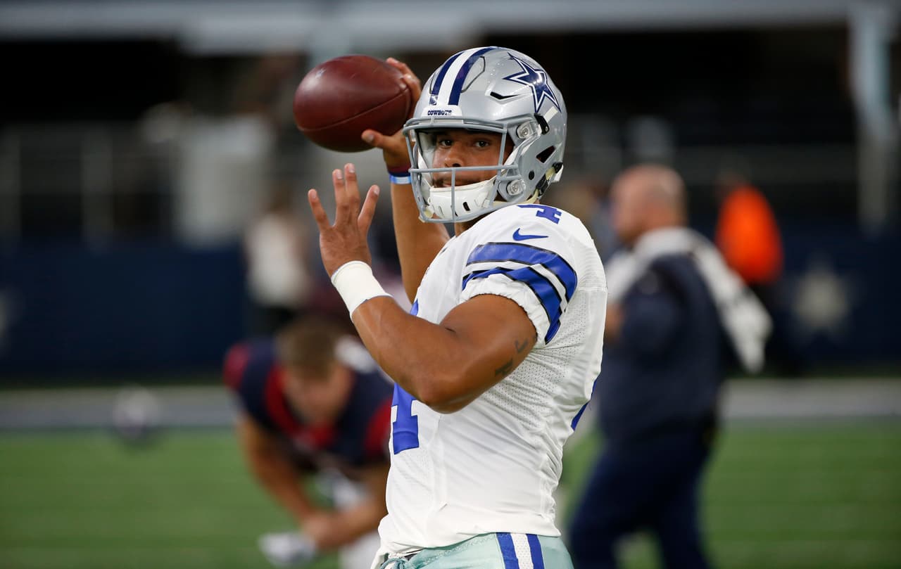Dallas Cowboys quarterback Dak Prescott throws during warm ups before taking on the Houston Texans in a preseason NFL football game, Thursday, Sept. 1, 2016, in Arlington, Texas. (AP Photo/Ron Jenkins)