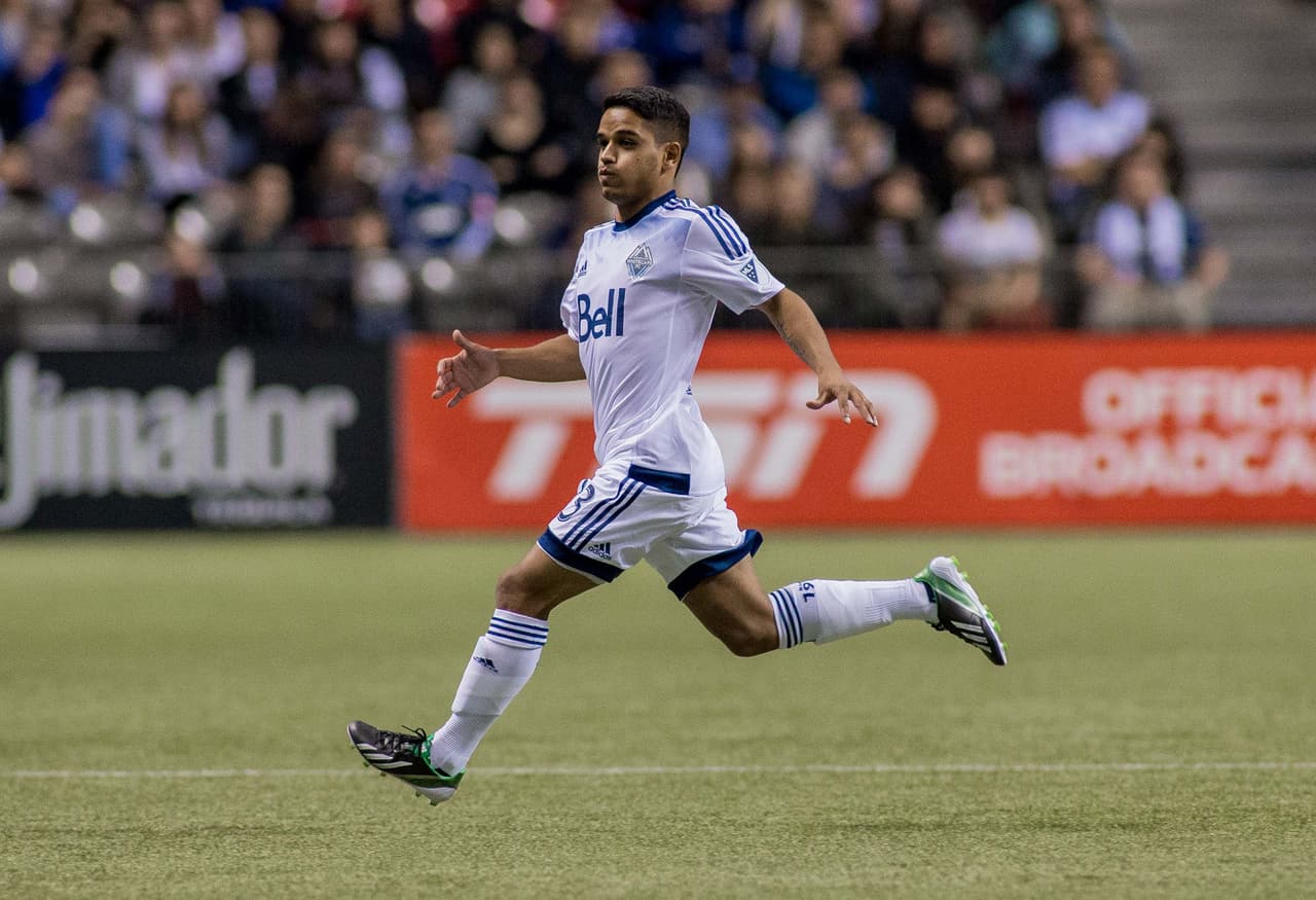 Apr 25, 2015; Vancouver, British Columbia, CAN; Vancouver Whitecaps FC forward Christian Techera (13) vs DC United on Bell Pitch at BC Place Stadium. DC United won 2-1. Mandatory Credit: Bob Frid-USA TODAY Sports