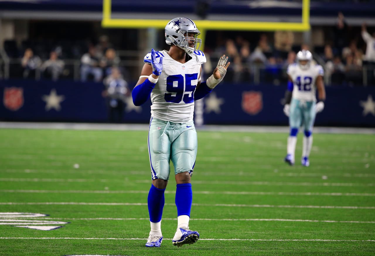 Dallas Cowboys' David Irving celebrates sacking Tampa Bay Buccaneers' Jameis Winston during an NFL football game, Sunday, Dec. 18, 2016, in Arlington, Texas. (AP Photo/Ron Jenkins)