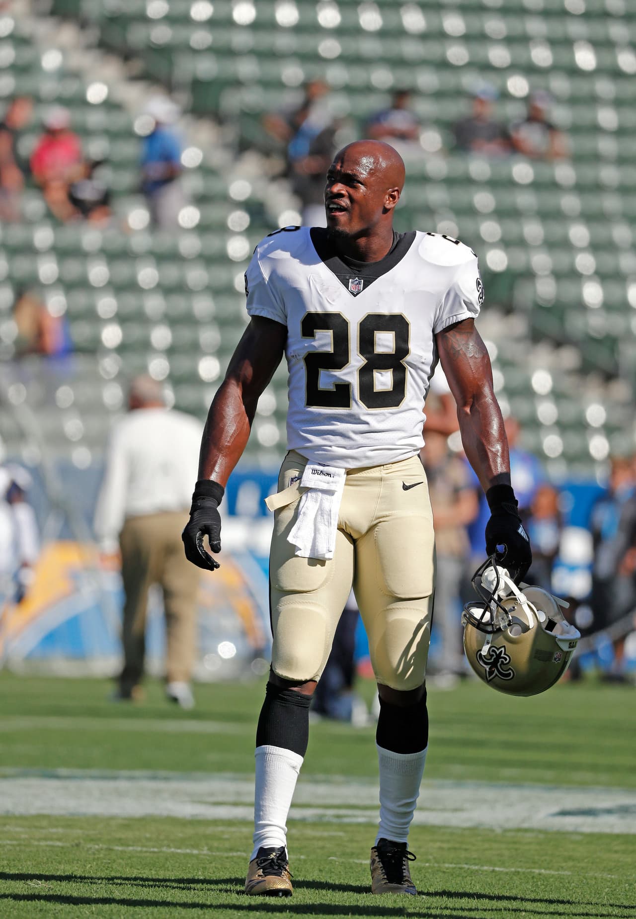 New Orleans Saints running back Adrian Peterson (28) warms up during an NFL football game against the Los Angeles Chargers on Sunday, Aug. 20, 2017 in Carson, Calif. The Saints won the game, 13-7. (Greg Trott via AP)