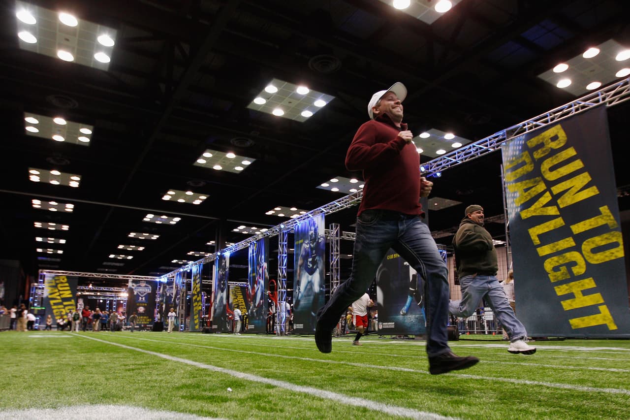 INDIANAPOLIS, IN - FEBRUARY 03: Fans run through an obstacle course at the Super Bowl XLVI NFL Experience presented by GMC at the Indiana Convention Center on February 3, 2012 in Indianapolis, Indiana. The New England Patriots will play the New York Giants in Super Bowl XLVI on February 5, 2011 at Lucas Oil Stadium in Indianapolis, Indiana. (Photo by Chris Graythen/Getty Images)
