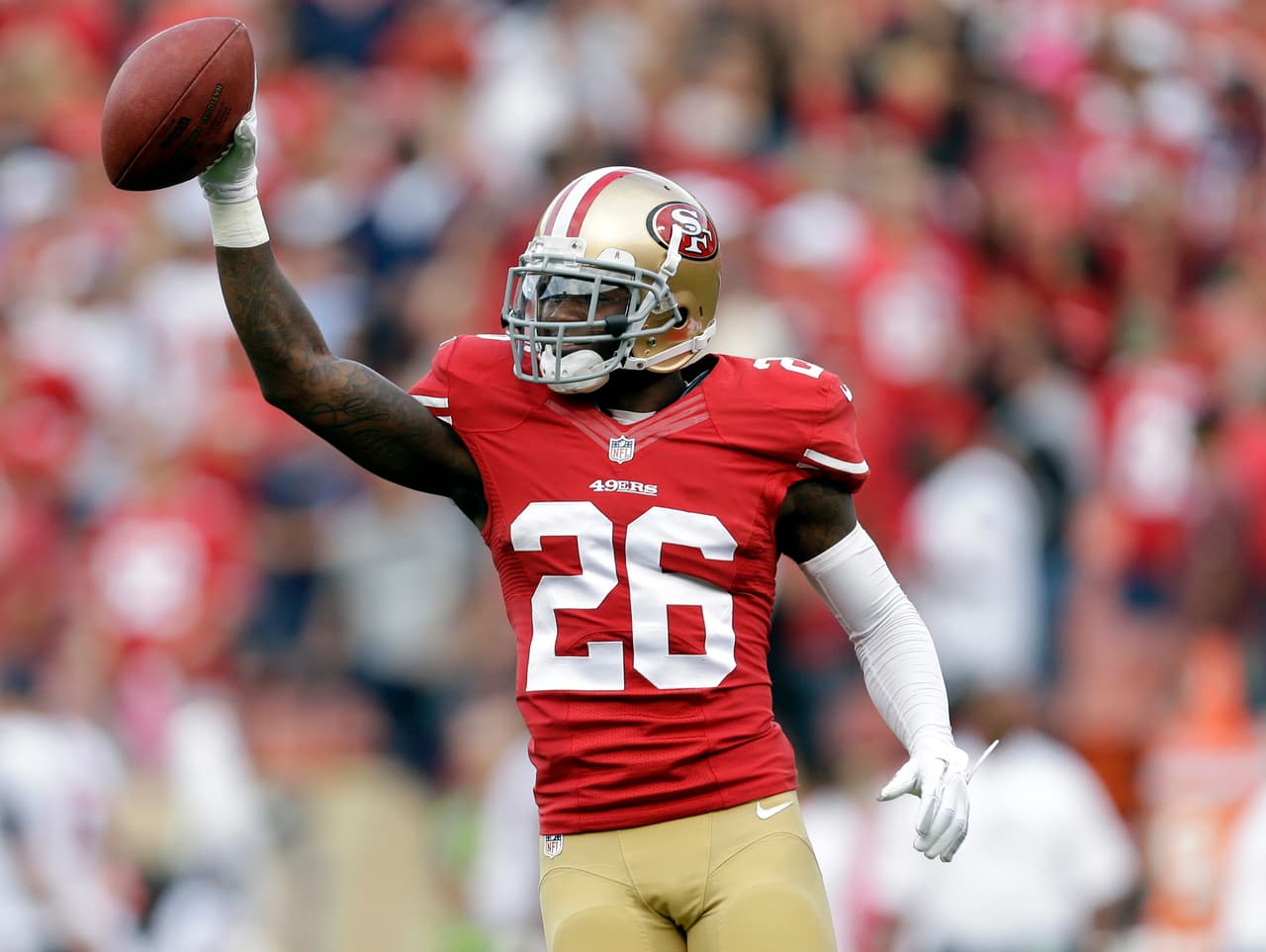 FILE - In this Oct. 6, 2013, file photo, San Francisco 49ers cornerback Tramaine Brock celebrates after scoring a touchdown in the first half of an NFL football game against the Houston Texans in San Francisco. Brock, a fourth-year pro and NFL starter for all of five games, has four interceptions, 28 tackles and 12 pass deflections this year to help lead a dominant defense. (AP Photo/Marcio Jose Sanchez, File)