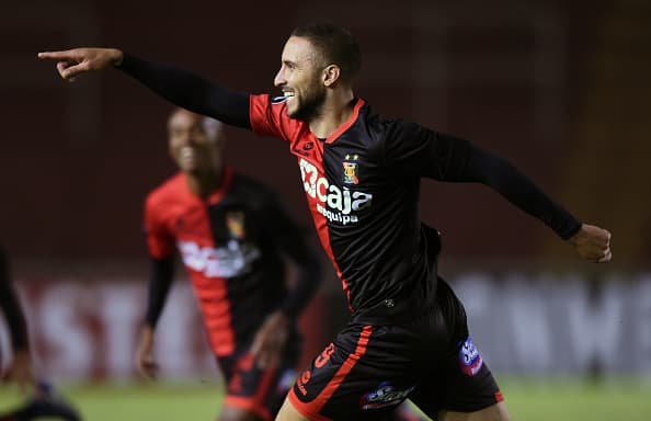 Peru's Melgar player Emanuel Herrera celebrates scoring against Colombias Independiente Medellin during their Copa Libertadores game at the UNSA Stadium in the southern Andean city of Arequipa on April 26, 2017. / AFP PHOTO / CRIS BOURONCLE (Photo credit should read CRIS BOURONCLE/AFP/Getty Images)