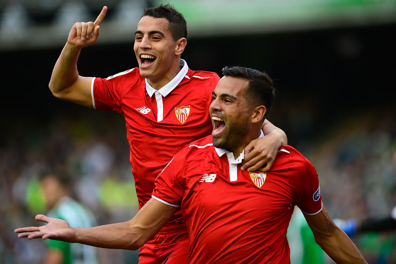 Sevilla's Argentinian defender Gabriel Mercado (R) celebrates after scoring a goal with Sevilla's French forward Wissam Ben Yedder (L) during the Spanish league football match Real Betis vs Sevilla FC at the Benito Villamarin stadium in Sevilla on February 25, 2017. / AFP / CRISTINA QUICLER (Photo credit should read CRISTINA QUICLER/AFP/Getty Images)