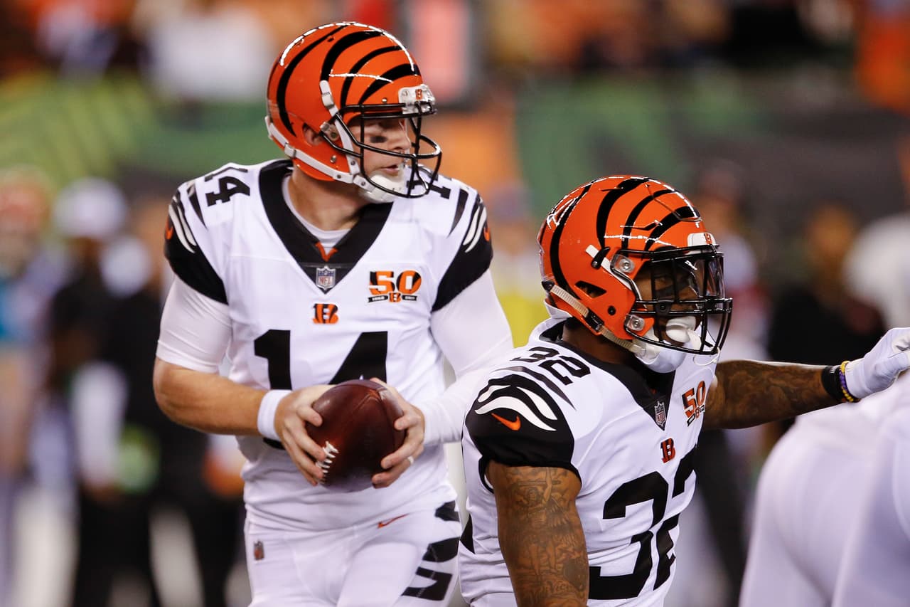 Cincinnati Bengals quarterback Andy Dalton (14) looks to pass in the first half of an NFL football game against the Houston Texans, Thursday, Sept. 14, 2017, in Cincinnati. (AP Photo/Gary Landers)