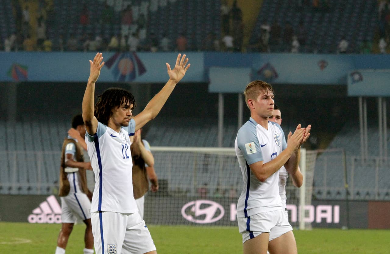 England's Nya Kirby, left, and others acknowledge the crowd as they celebrate their victory against Japan during the FIFA U-17 World Cup match in Kolkata, India, Tuesday, Oct. 17, 2017. (AP Photo/Bikas Das)