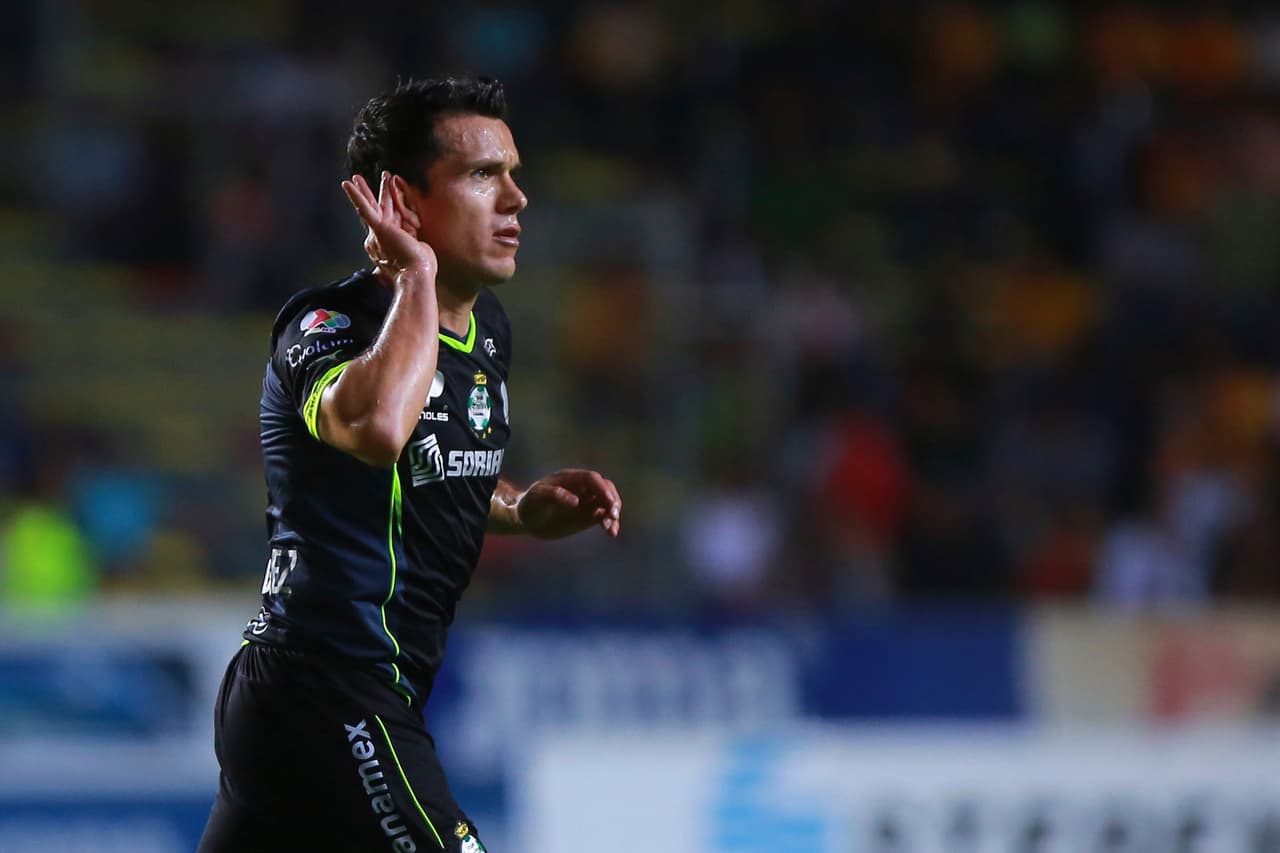 MORELIA, MEXICO - MARCH 21: Juan Pablo Rodriguez of Santos celebrates the first goal of his team during a match between Morelia and Santos Laguna as part of the 12th round Clausura 2014 Liga MX at Morelos Stadium on March 21, 2014 in Morelia, Mexico. (Photo by Hector Vivas/LatinContent/Getty Images)