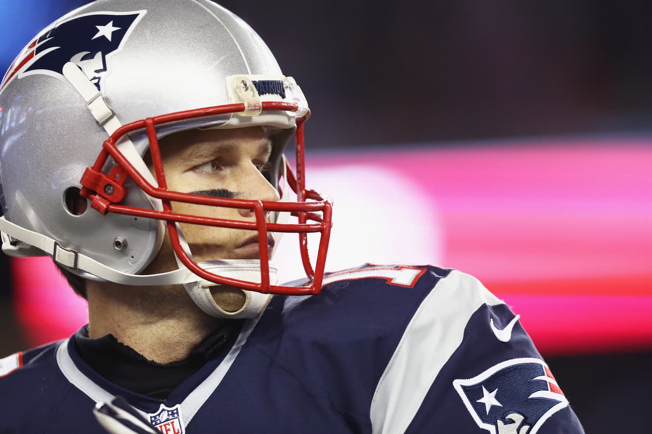 FOXBORO, MA - DECEMBER 12: Tom Brady #12 of the New England Patriots reacts during the second half against the Baltimore Ravens at Gillette Stadium on December 12, 2016 in Foxboro, Massachusetts. (Photo by Maddie Meyer/Getty Images)