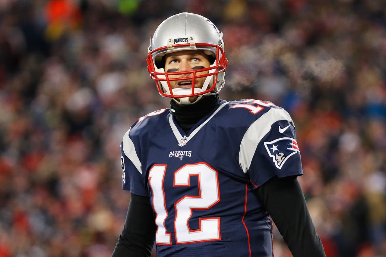 FOXBORO, MA - JANUARY 14: Tom Brady #12 of the New England Patriots looks on in the first half against the Houston Texans during the AFC Divisional Playoff Game at Gillette Stadium on January 14, 2017 in Foxboro, Massachusetts. (Photo by Jim Rogash/Getty Images)