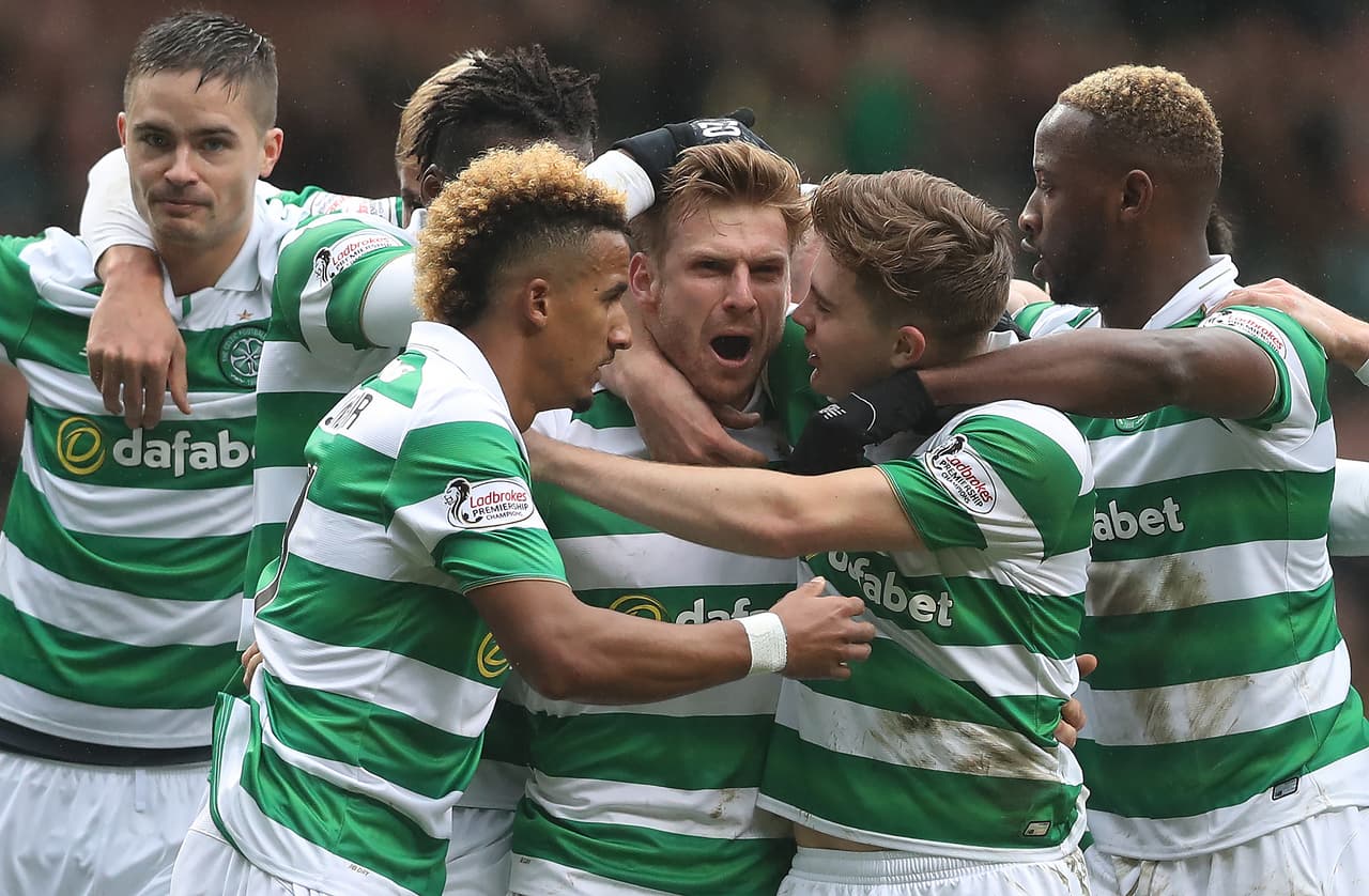 GLASGOW, SCOTLAND - MARCH 12: Stuart Armstrong of Celtic is congratulated by team mates after he scores the opening goal during the Ladbrokes Scottish Premiership match between Celtic and Rangers at Celtic Park on March 12, 2017 in Glasgow, Scotland. (Photo by Ian MacNicol/Getty Images)
