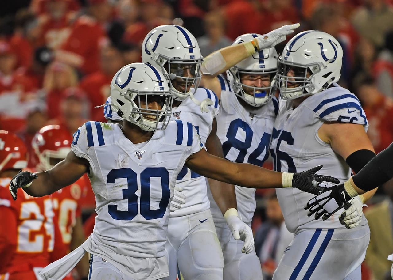 KANSAS CITY, MO - OCTOBER 06: Defensive back George Odum #30 of the Indianapolis Colts and his teammates celebrate as the defeat the Kansas City Chiefs against at Arrowhead Stadium on October 6, 2019 in Kansas City, Missouri. (Photo by Peter Aiken/Getty Images)