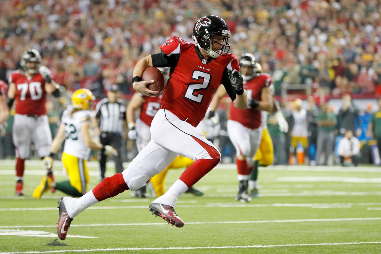 ATLANTA, GA - JANUARY 22: Matt Ryan #2 of the Atlanta Falcons runs for a 14 yard touchdown in the second quarter against the Green Bay Packers in the NFC Championship Game at the Georgia Dome on January 22, 2017 in Atlanta, Georgia. (Photo by Kevin C. Cox/Getty Images)