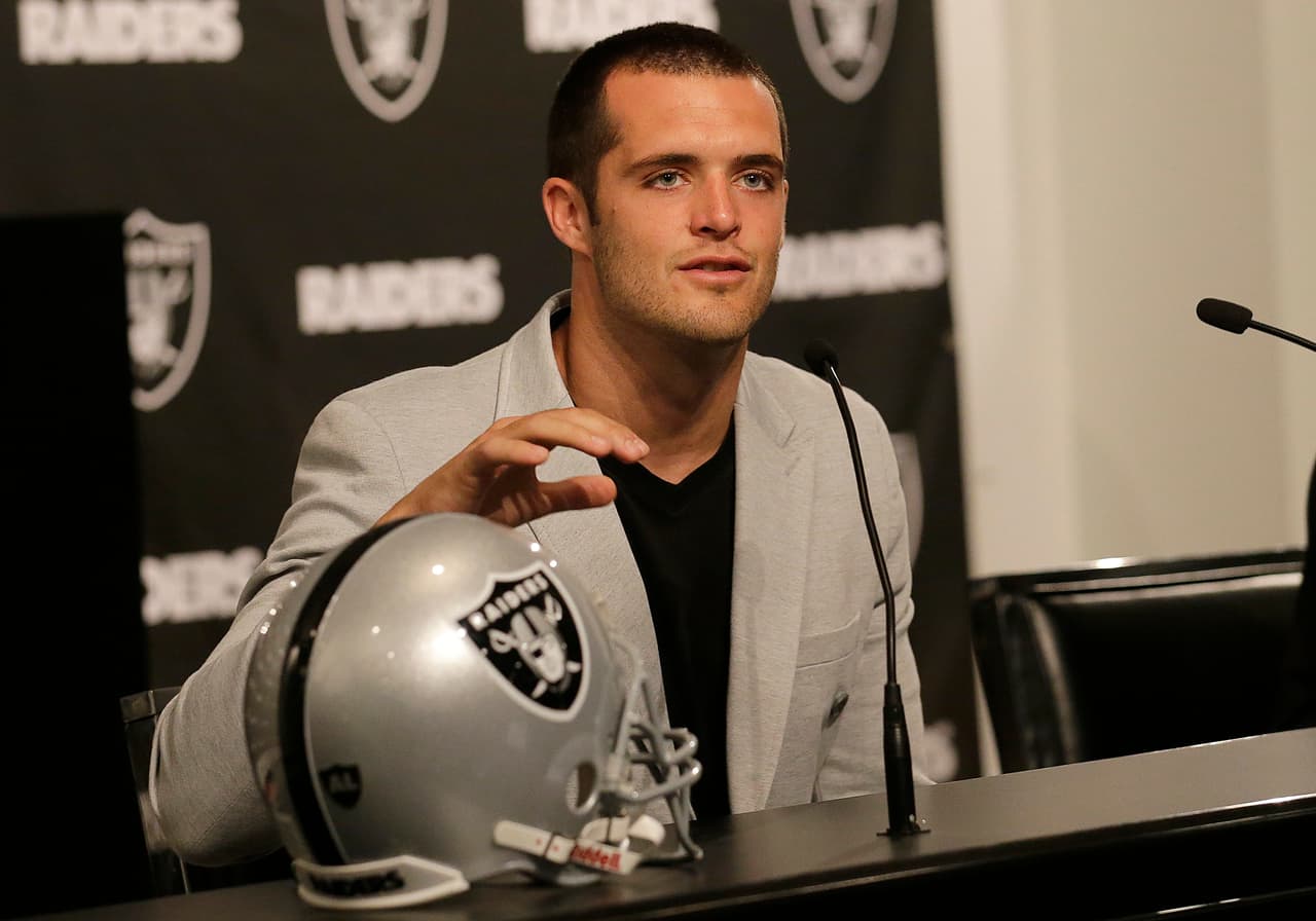 Oakland Raiders quarterback Derek Carr speaks at a news conference in Oakland, Calif., Friday, June 23, 2017. (AP Photo/Jeff Chiu)