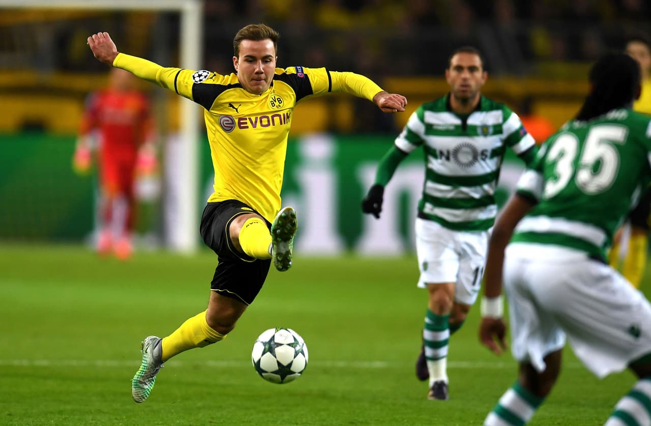 TOPSHOT - Dortmund's midfielder Mario Goetze vies for the ball during the UEFA Champions League Group F football match between BVB Borussia Dortmund and Sporting CP in Dortmund, western Germany, on November 2, 2016. / AFP / PATRIK STOLLARZ (Photo credit should read PATRIK STOLLARZ/AFP/Getty Images)