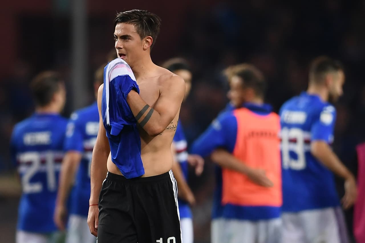 Juventus' forward Paulo Dybala from Argentina reacts at the end of the Italian Serie A football match Sampdoria Vs Juventus on November 19, 2017 at the 'Luigi Ferraris' Stadium in Genoa. Sampdoria won 3-2. / AFP PHOTO / MARCO BERTORELLO (Photo credit should read MARCO BERTORELLO/AFP/Getty Images)