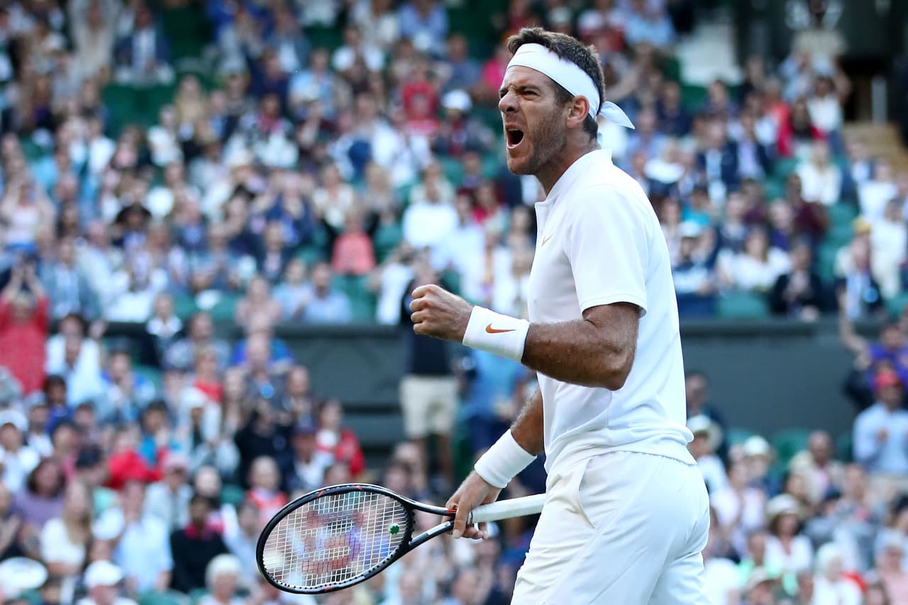 LONDON, ENGLAND - JULY 11: Juan Martin Del Potro of Argentina celebrates winning a point against Rafael Nadal of Spain during their Men's Singles Quarter-Finals match on day nine of the Wimbledon Lawn Tennis Championships at All England Lawn Tennis and Croquet Club on July 11, 2018 in London, England. (Photo by Clive Brunskill/Getty Images)