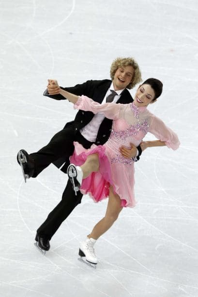 Los estadounidenses Meryl Davis y Charlie White, vigentes subcampeones olímpicos, lideran la clasificación con una ventaja de 2.56 puntos (78.89 puntos).